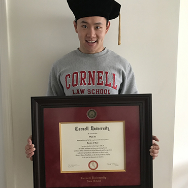 Cornell University diploma frame & happy grad