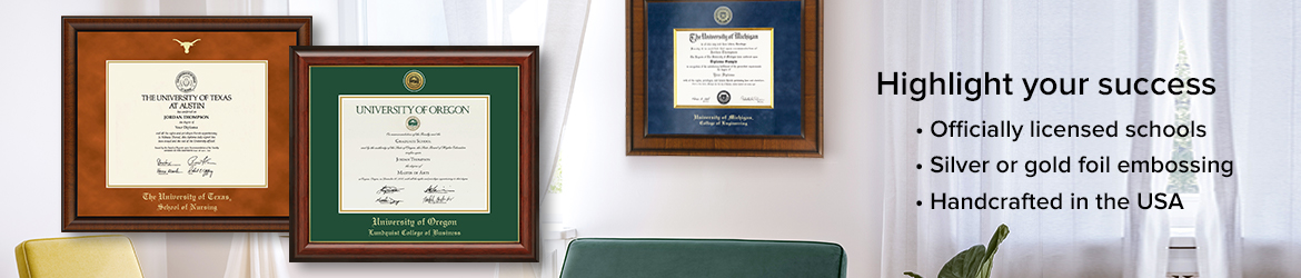 graduate school frames hanging on a wall