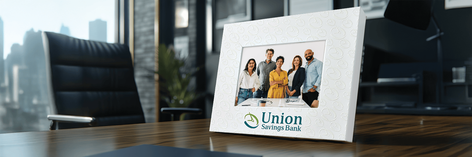 branded photo frame on desk