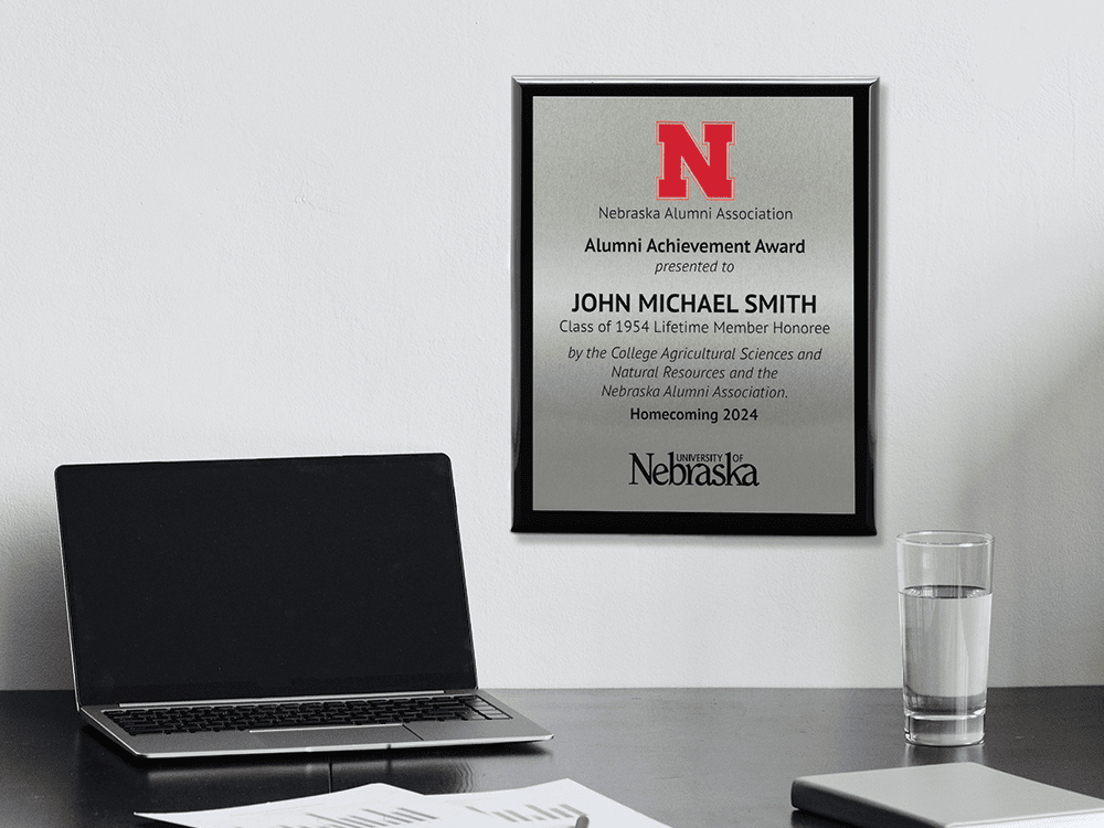 custom plaque on wall with desk