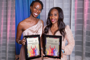 Women holding Enterprising Women frames made by Church Hill Classics