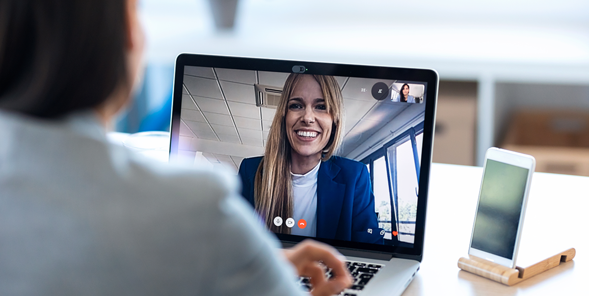 An account manager talking to a customer on a computer video call