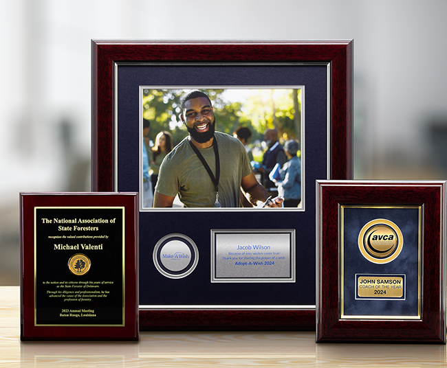 Three custom engraved photo and medallion frames - Custom Framing Programs