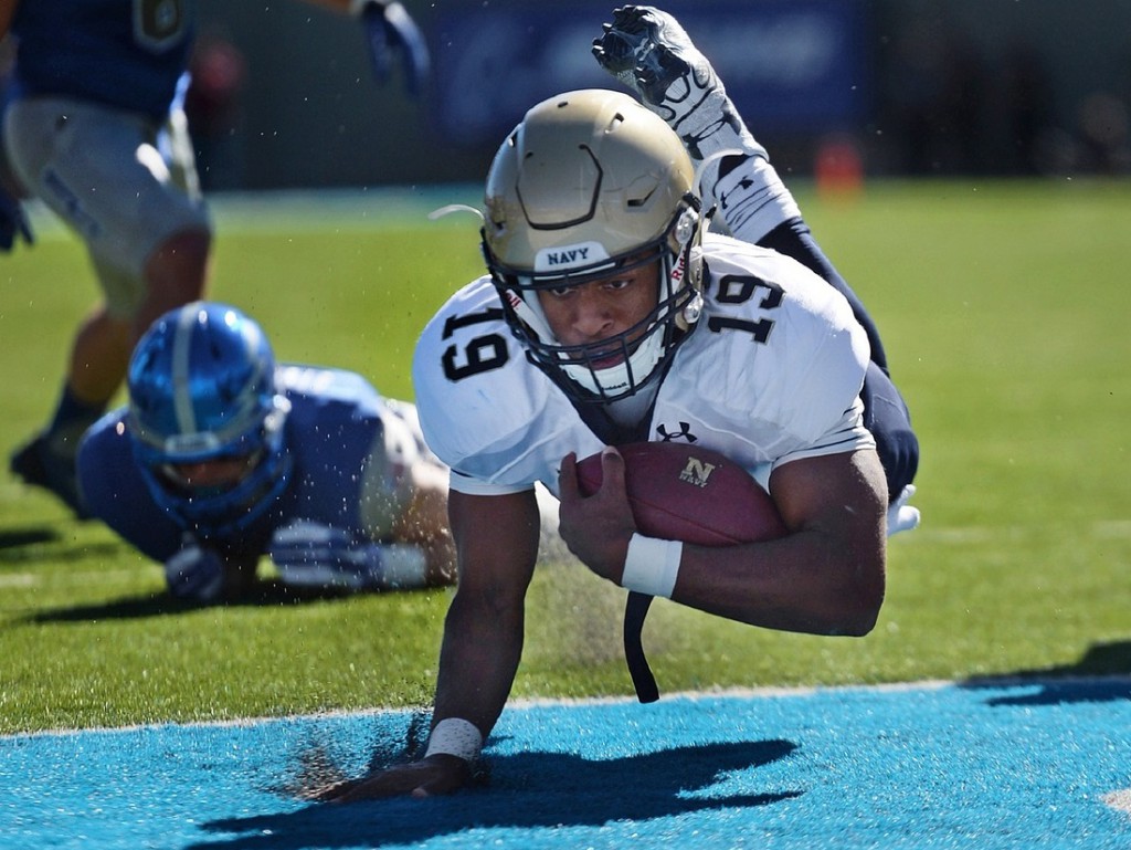 football player scoring a touchdown