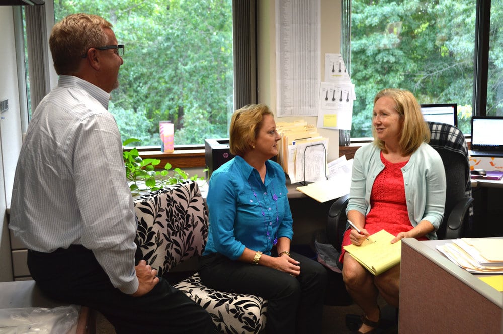 lucie talking with joe and lori in office