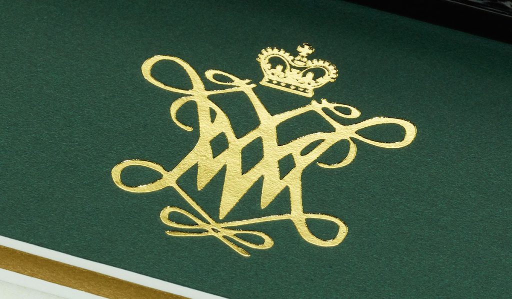 college of william and mary seal embossed into green mat