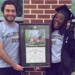 millersville grads with diploma frame