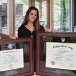 young woman holding her cornell frame and lehigh frame