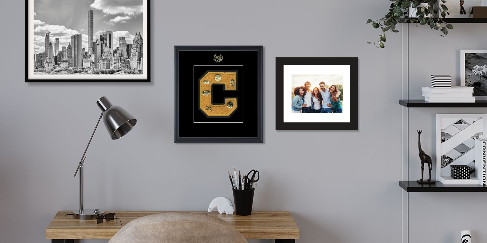 Yellow varsity letter in shadow box frame above desk in teen bedroom