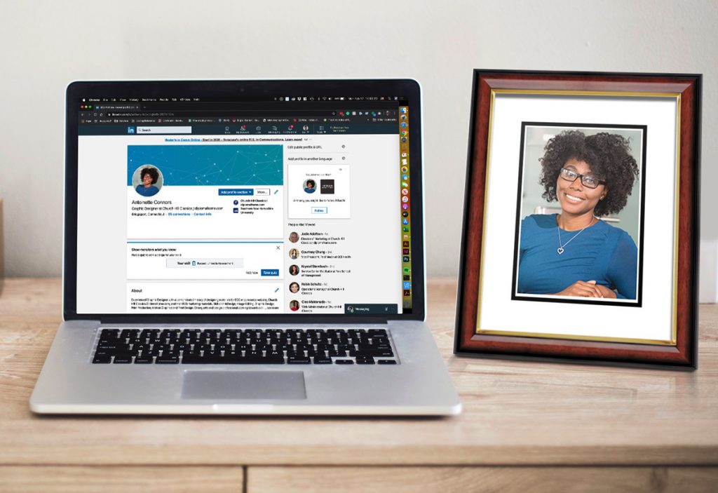 laptop with linkedin on screen and photo frame with headshot inside