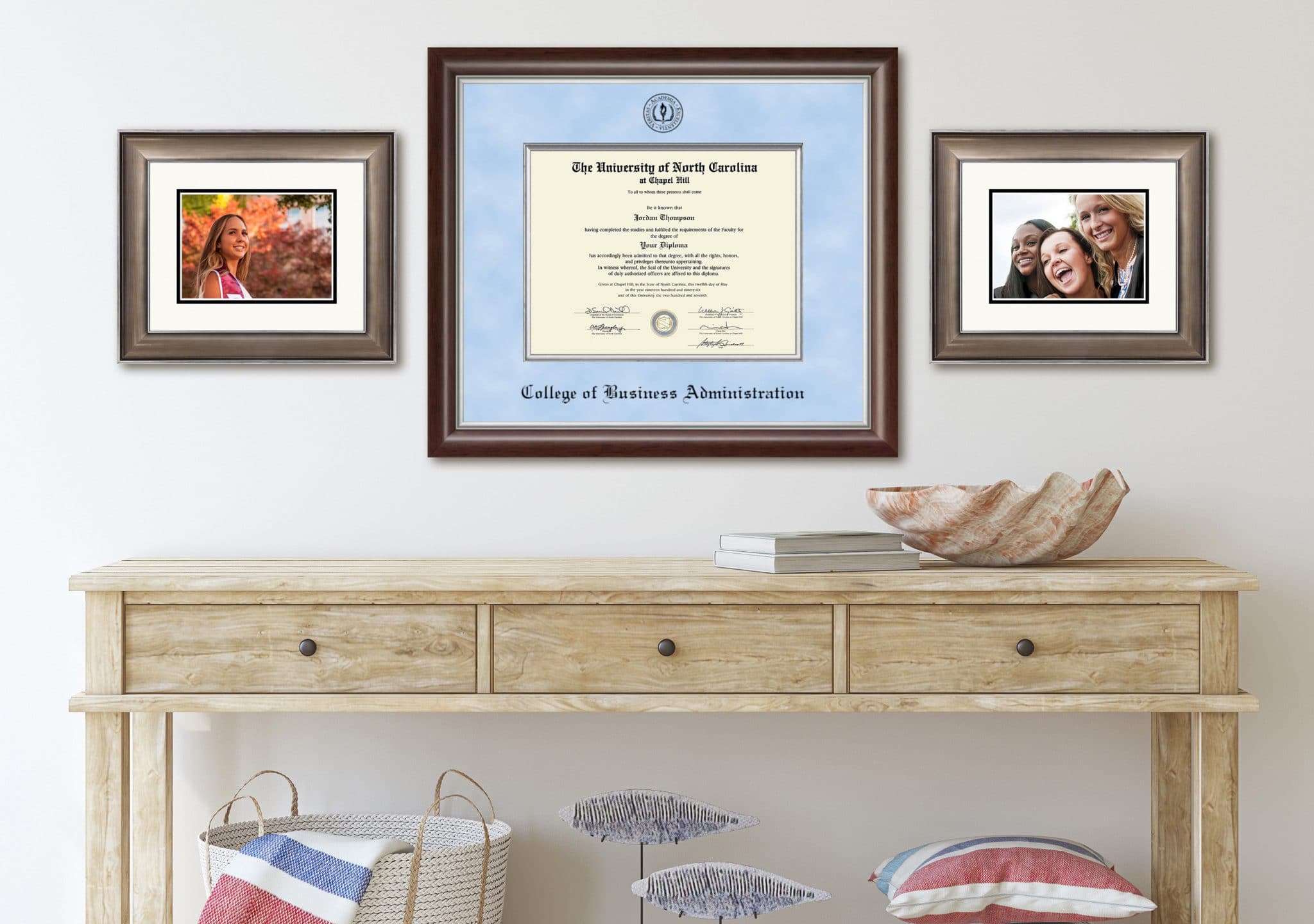Diploma frame and photo frames on wall