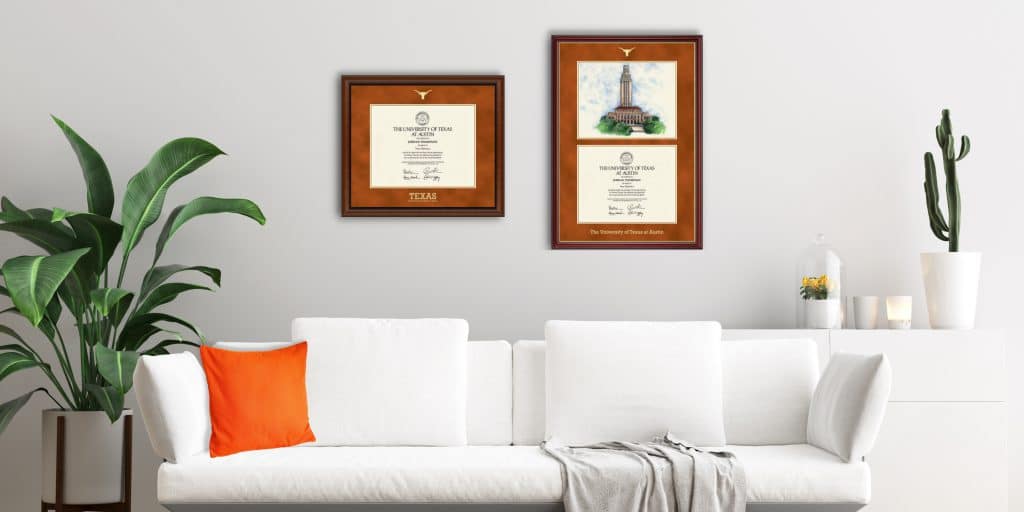 UT Austin diploma frames on wall above couch