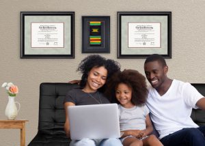 Family on couch with frames on wall