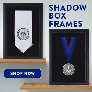 stole frame and medallion frame on shelves