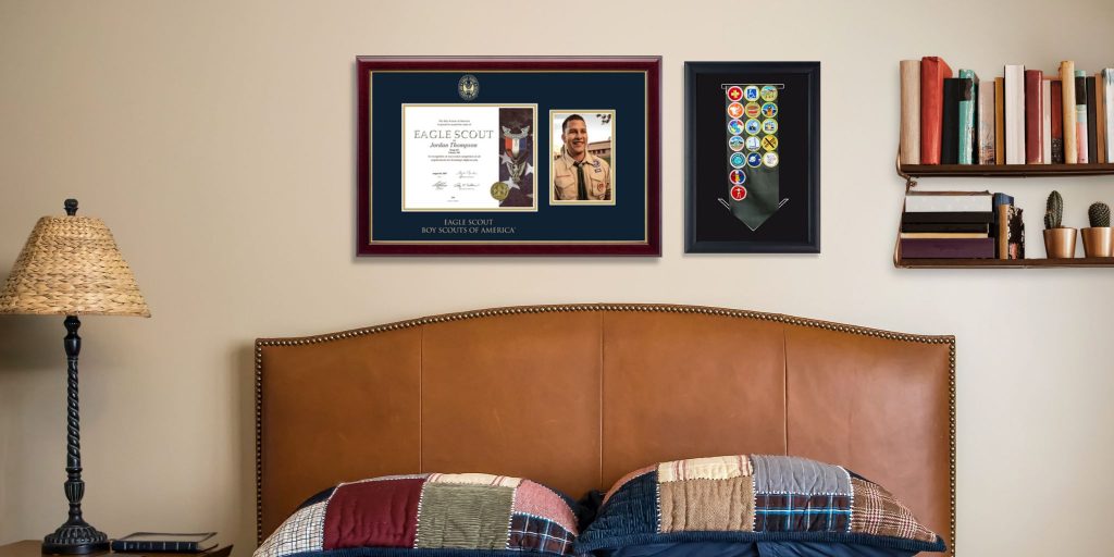 custom eagle scout certificate frame and photo frame above headboard hung on bedroom wall