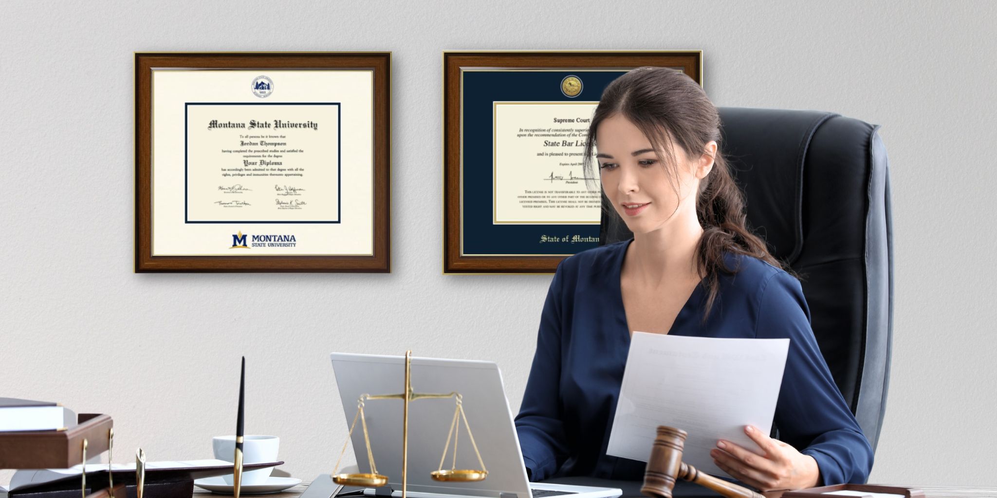 lawyer at desk with montana state university diploma frame on wall
