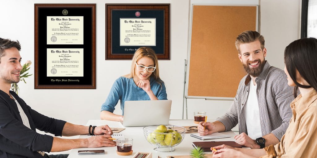 People meeting in office with frames in background