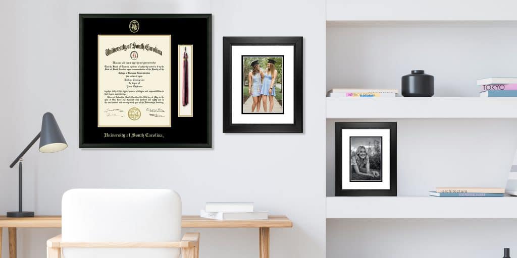 Tassel frame and photo frames in white office