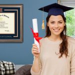 girl holding diploma next to illinois u frame