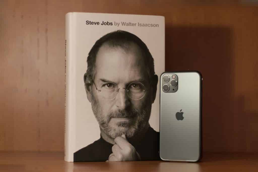 steve jobs biography next to iphone