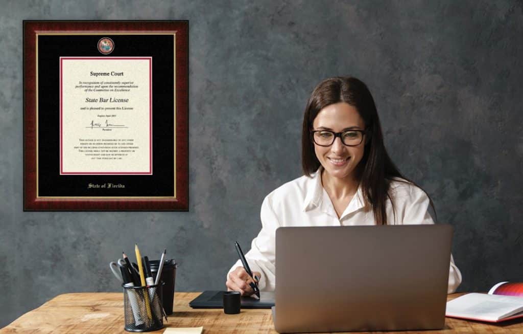 lawyer in office with state bar frame on wall