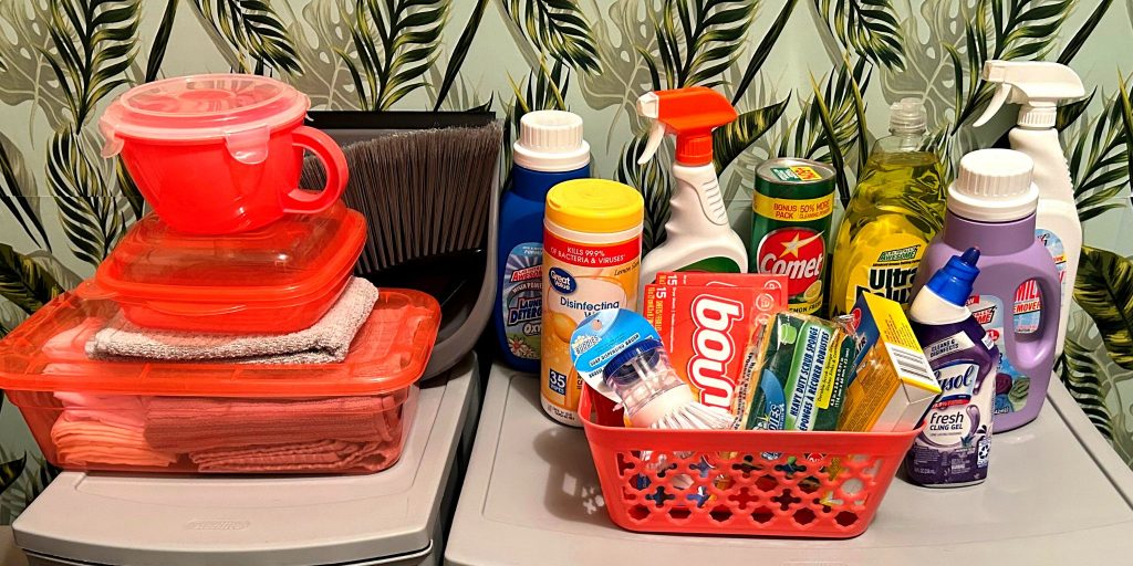cleaning supplies and storage containers in dorm
