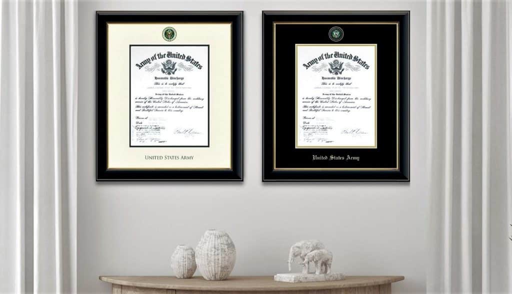 two us army certificate frames on wall