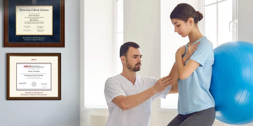 physical therapist with patient and framed credentials on wall