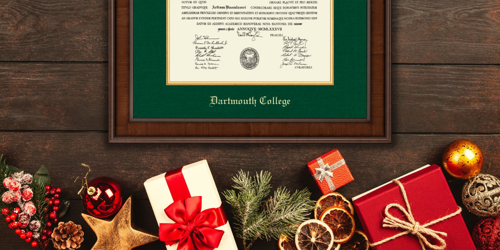 dartmouth framed diploma on table with christmas decorations