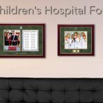 Framed donor certificates on hospital wall