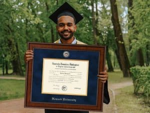 grad holding howard university diploma frame