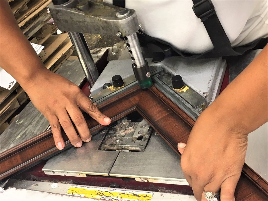 hands joining frame moulding