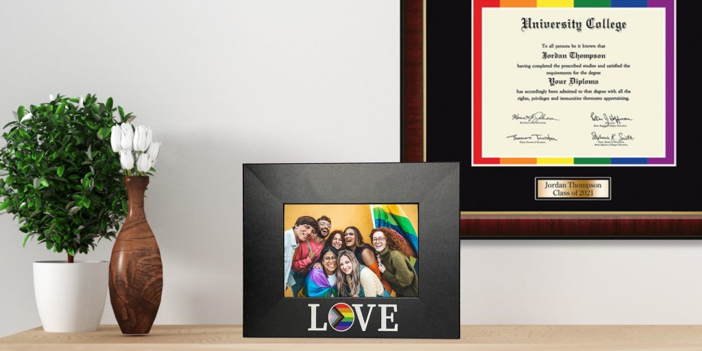 LQBTQ+ Photo Frame on desk with rainbow designed frame on wall behind it