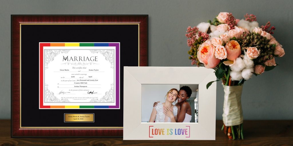 LGBTQ marriage certificate frame next to a Love Is Love photo frame on table