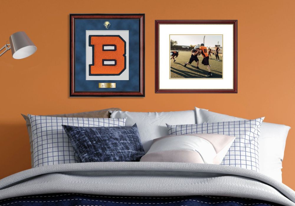 varsity letter shadow box and custom photo frame hung on wall above a bed