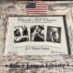 closeup of distressed white frame with american flag and life love liberty printing