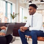 Interviewer and job interviewee in office conducting an interview