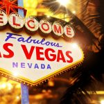 Colorful neon sign lit up at night that says Welcome to Fabulous Las Vegas Nevada.