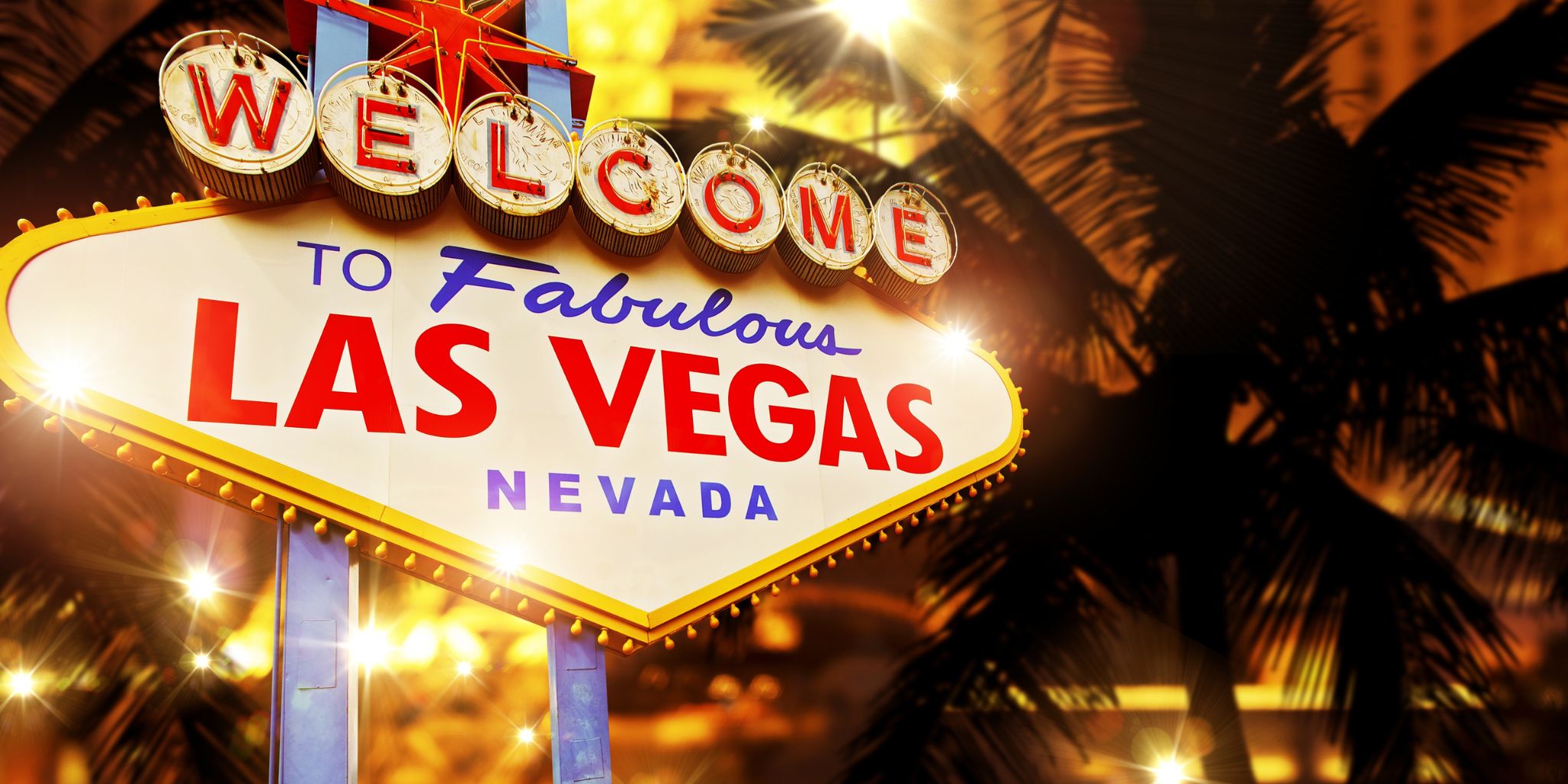 Colorful neon sign lit up at night that says Welcome to Fabulous Las Vegas Nevada.