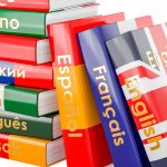 Collection of language textbooks with spines that read English, Francais, Espanol, Italiano, Deutsch, and more.