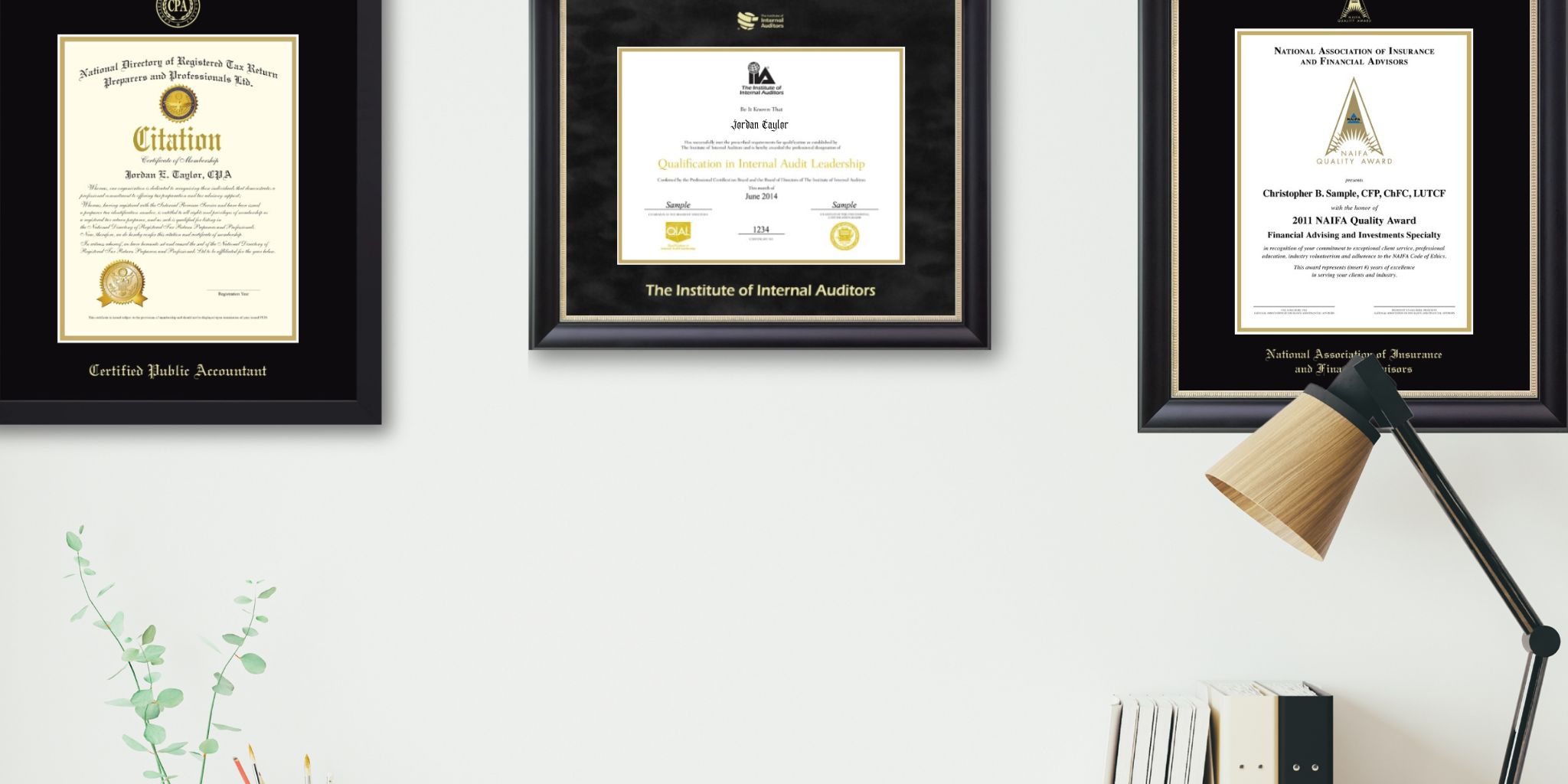 Office wall with CPA certificate frame, Institute of Internal Auditors certificate frame, and NAIFA certificate frame with desk lamp and books in photo.