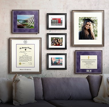 Custom diploma frames hanging on a wall