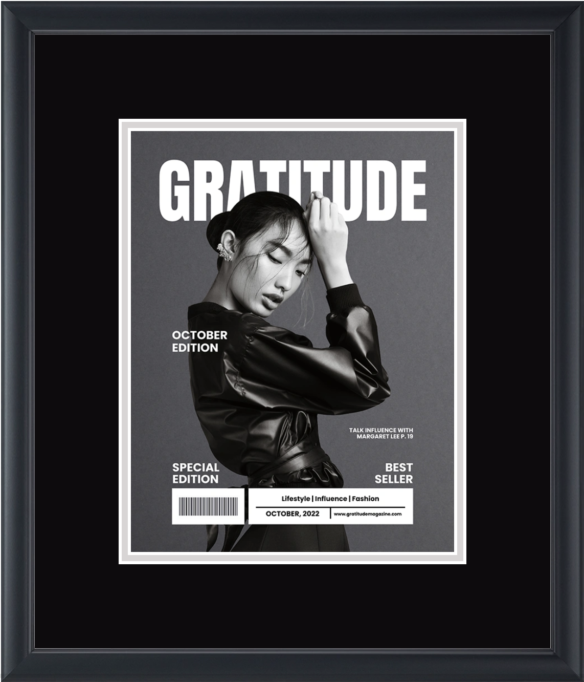 Framed black-and-white fashion magazine cover titled ‘GRATITUDE,’ featuring a woman posing in a dark outfit with bold editorial text.