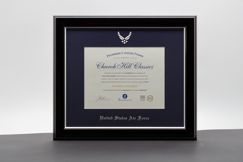 Framed certificate displayed with a United States Air Force emblem and dark blue matting inside a black wood frame.