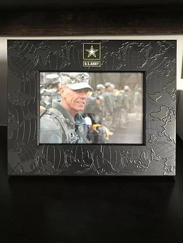 Decorative U.S. Army photo frame displaying a service member in uniform, featuring a textured world map design and Army emblem at the top.