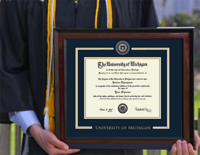 graduate with diploma frame