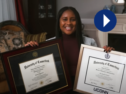 Verified customer photo for Evian C., sharing their experience with Church Hill Classics diploma frames, next to a play icon (video thumbnail)