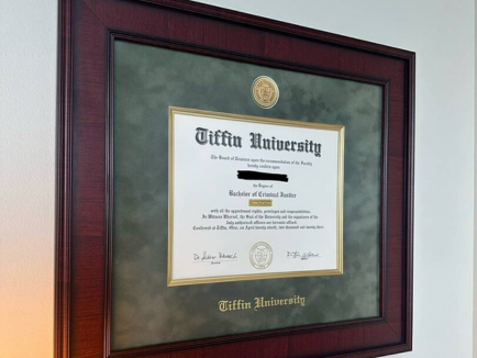 Verified customer photo for Dustin M., sharing their experience with Church Hill Classics diploma frames