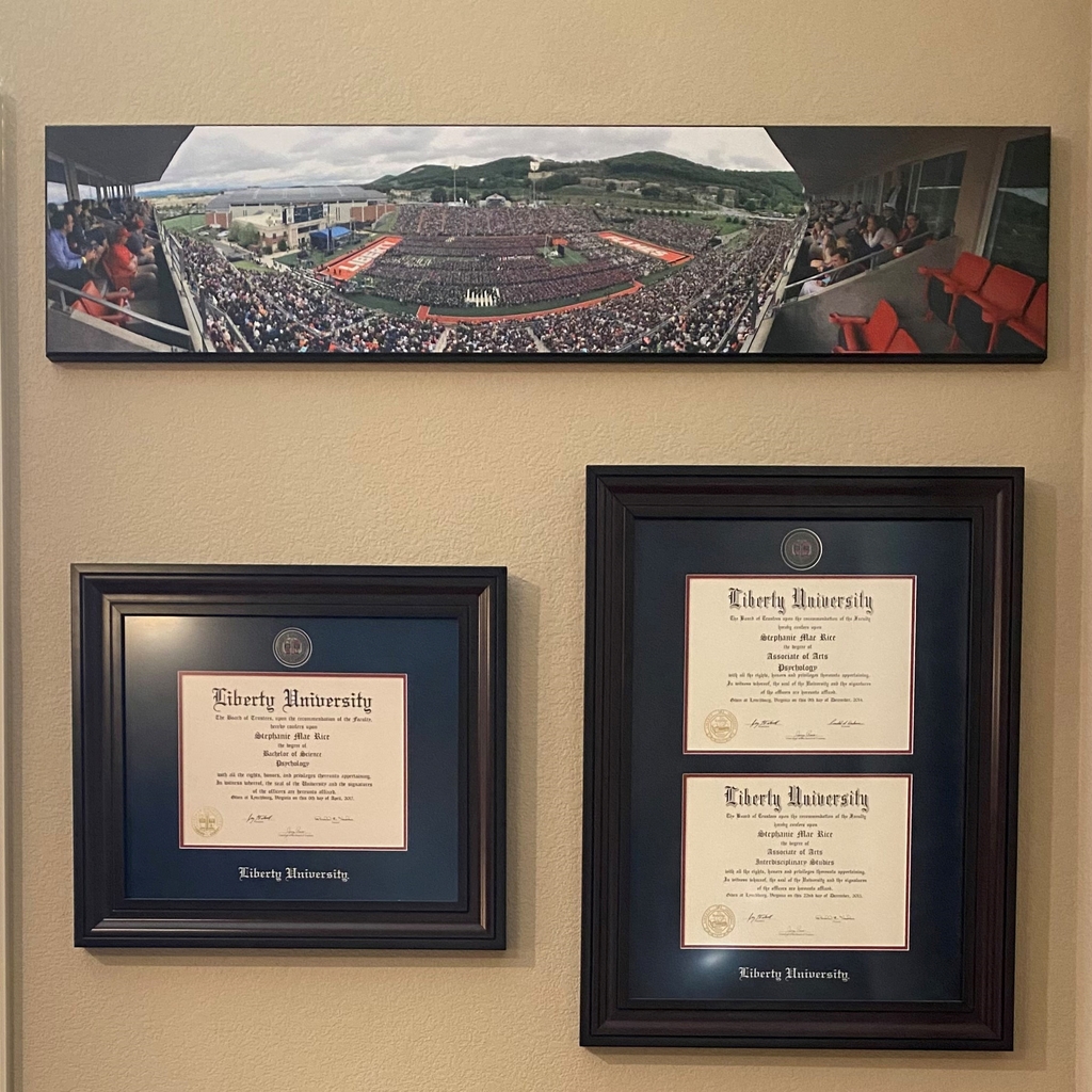 Liberty University Masterpiece diploma frames hanging on the wall