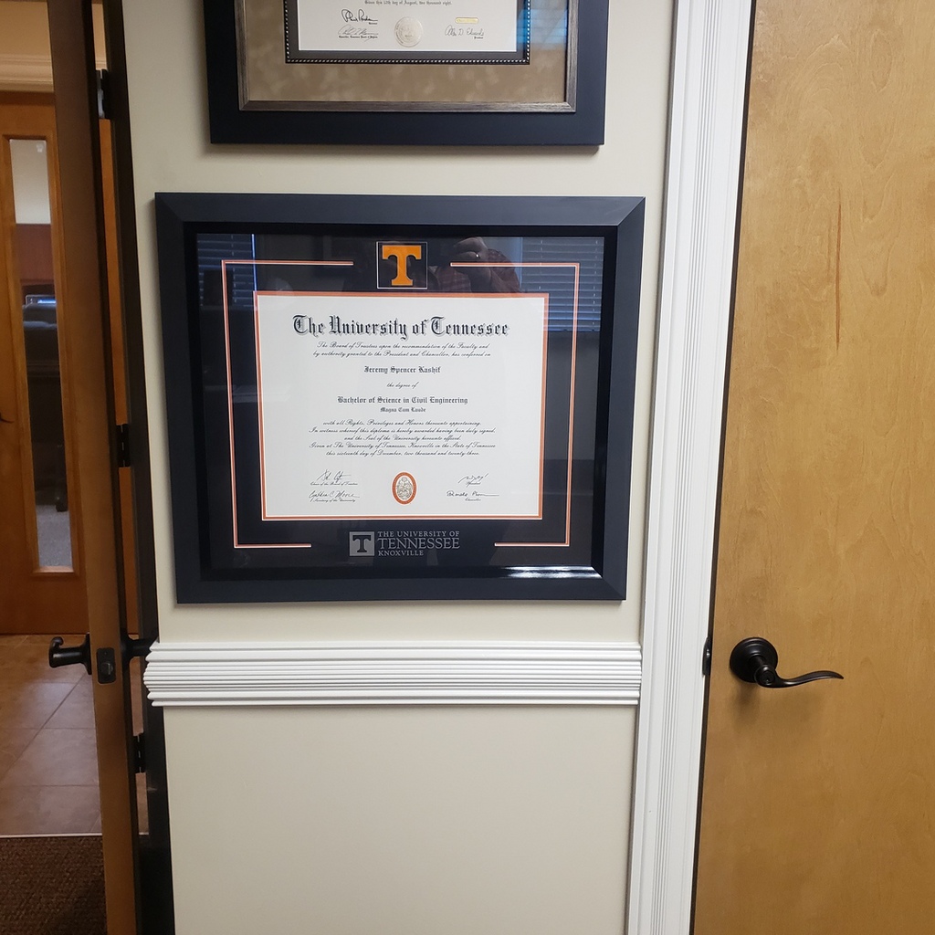 University of Tennessee diploma frame hanging on wall
